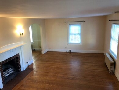  Light filled Large living room w/ hardwoods