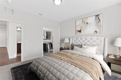 The secondary bedroom is large with a big closet a
