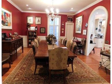 The formal dining room offers a welcoming place to