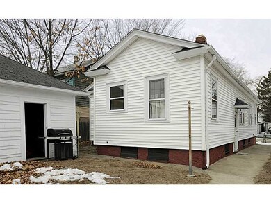 Exterior Back. backyard with access to two car gar