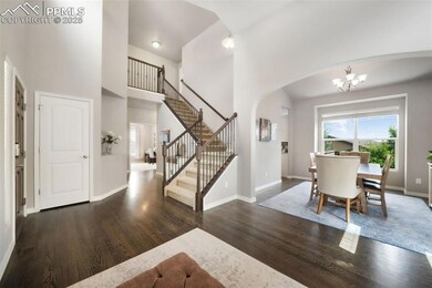 Front entry, hardwood floors, formal sitting room, bright vaulted ceilings