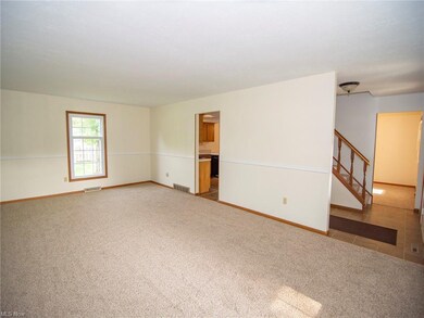 Heads into the kitchen