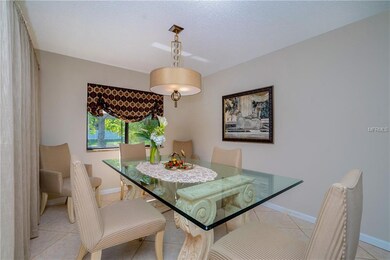 Separate Dining room has tiled flooring and slidin