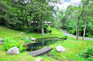 Beautiful Sloping Property with Pond