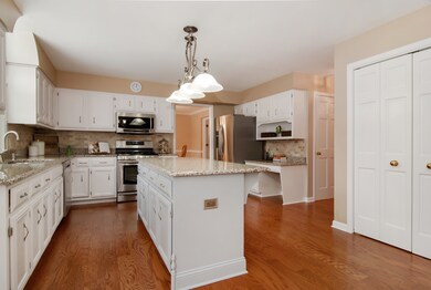 Gorgeous updated kitchen w/granite counters, islan