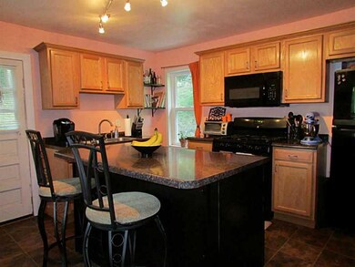 Kitchen. Kitchen island was added in the past few 