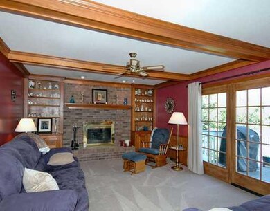 Family Room. Family room with brick fireplace & cu