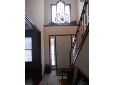 Enter the dramatic two story foyer