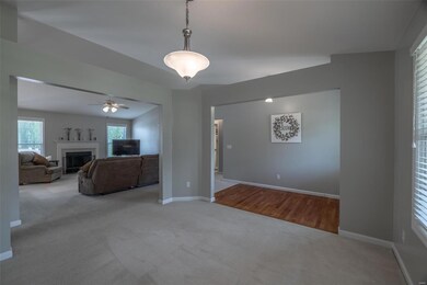 View from formal dining room space towards entry a