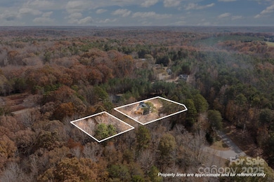 Land on both sides of the street - lots of possibilities here!