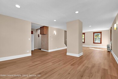 Huge Living Space with wood floors