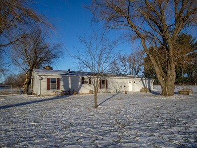 This home features a large attached garage that al
