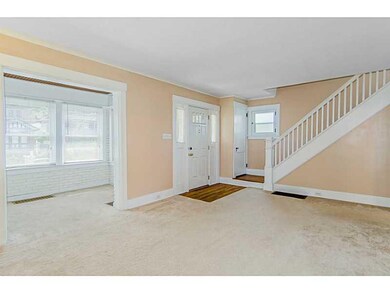 Living Room. Open floor plan with open staircase.