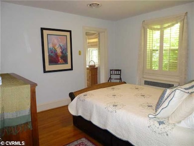 Master Bedroom - Door on back rght leads to adjace