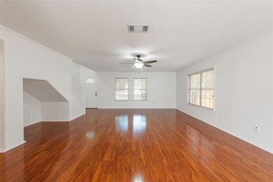 Unfurnished living room with wood finished floors