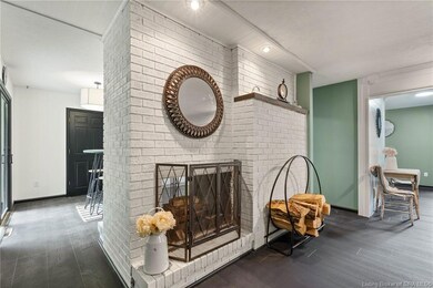 Double sided wood burning fireplace