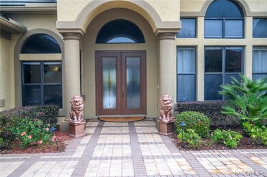 Stately glass double door entry.