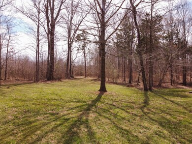 Home sits on a beautifully wooded 12.5 acres right off of Nashville Hwy