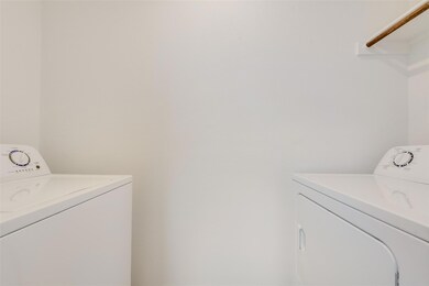 Laundry area featuring separate washer and dryer