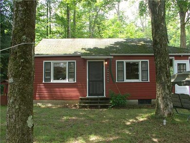 Exterior Front. At the top of the hill, nestled in