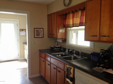 Kitchen and laundry room view 2
