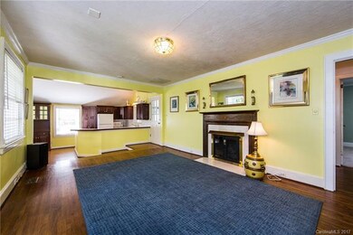 Bright and light living room has a fireplace with 
