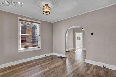 Archway leading into dining room.
