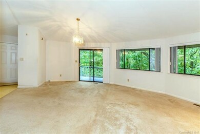 This home is surrounded by beautiful wooded privac