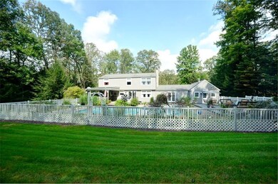 FENCED BACK YARD features gorgeous L-shaped HEATED