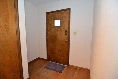 Original hardwood floors in entry and hallway.