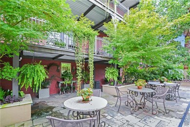 Relax in the lush courtyard just behind the gated 