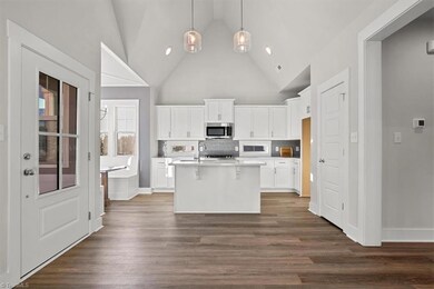 Photos are of a previously built Vineyard plan with other selections & options