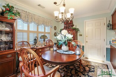 Dining room with door to garage.  Ceramic tile flo