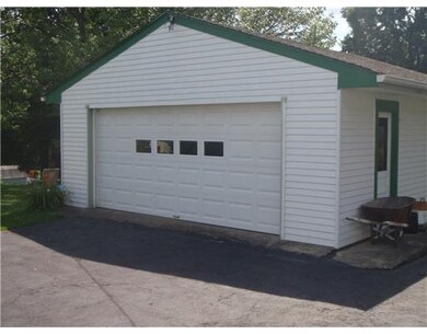 Parking Lot/Garage. TWO CAR DETACHED GARAGE PLUS A