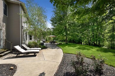 Private Back Patio with Lush Landscaping