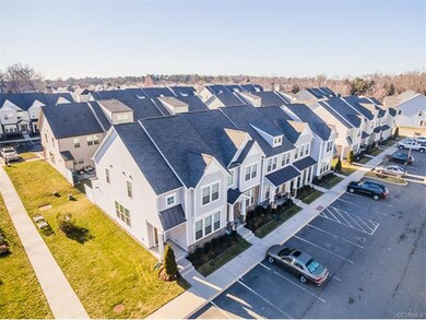 AERIAL VIEW OF TOWNHOME AND COMPLEX, END UNIT
