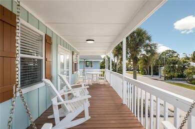 Covered front porch to enjoy the gulf breeze!