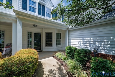 View of exterior entry featuring a porch