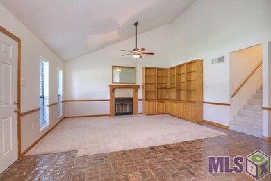 Vaulted ceilings, fireplace and built-ins.