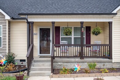 Upgraded front porch big enough for rocking chairs