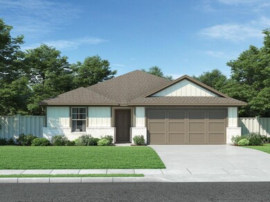 View of front facade featuring an attached garage