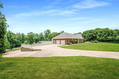 2 Separate attached garages!!! and LARGE DRIVEWAY / PARKING AREA ... perfect for multiple cars or even a place to park your boat!