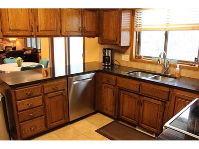 Kitchen updates include: Granite countertops, tile