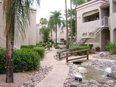 Inside Gate is Palm trees & waterfalls