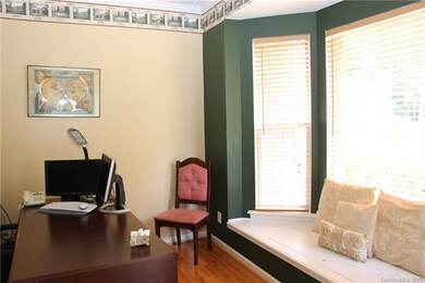 Lovely hardwoods adorn the office space. Enjoy hid