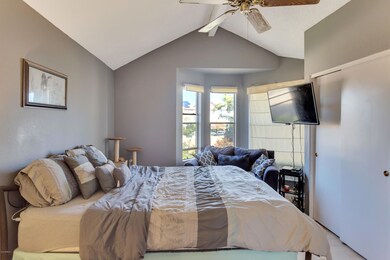 Master bedroom with vaulted ceiling