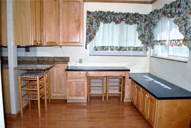 Dining room offers 2 large windows, bar counter, m