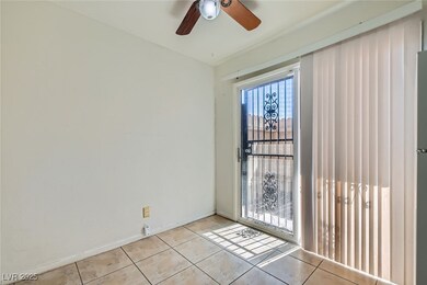 Unfurnished room featuring light tile patterned fl