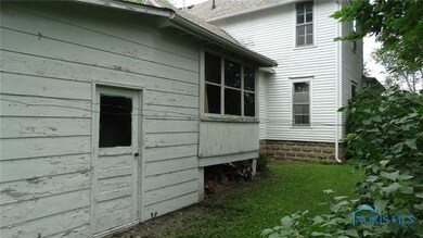 summer kitchen - garage facing South