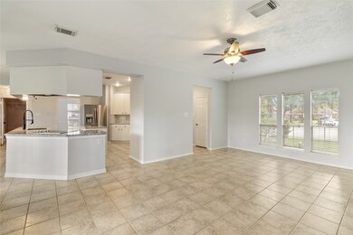 This spacious family room (15x12) with its desirab